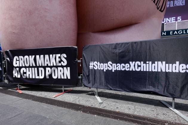 New York, NY- June 11th: A Giant Inflatable Sculpture of Elon Musk in Times Square Manhattan on June 11, displays the statement Ã¢â‚¬oeSpace XÃ¢â‚¬â ¢s Grok Makes AI Child PornÃ¢â‚¬Â.on June 11, 2026 Credit: Camara Porter USA  - ZUMAa123 20260611_zaa_a123_008 Copyright: xAdMediax