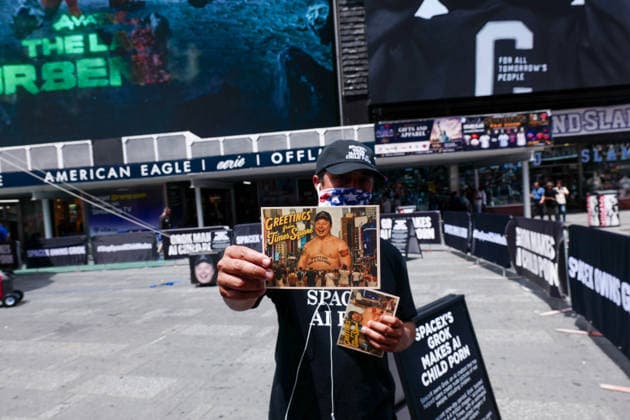 New York, NY- June 11th: A Giant Inflatable Sculpture of Elon Musk in Times Square Manhattan on June 11, displays the statement Ã¢â‚¬oeSpace XÃ¢â‚¬â ¢s Grok Makes AI Child PornÃ¢â‚¬Â.on June 11, 2026 Credit: Camara Porter USA - ZUMAa123 20260611_zaa_a123_013 Copyright: xAdMediax