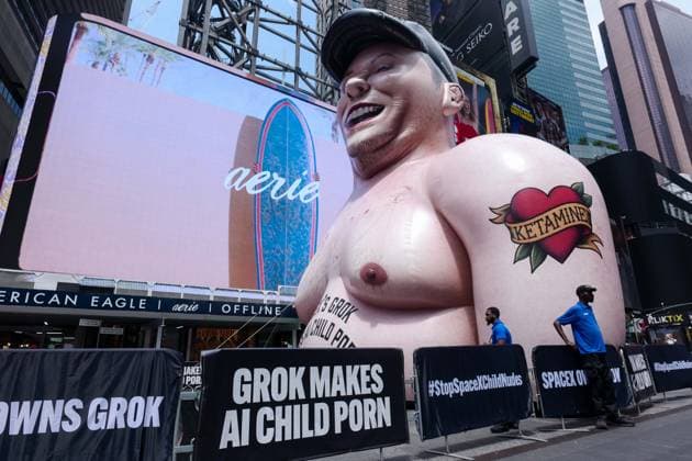 New York, NY- June 11th: A Giant Inflatable Sculpture of Elon Musk in Times Square Manhattan on June 11, displays the statement Ã¢â‚¬oeSpace XÃ¢â‚¬â ¢s Grok Makes AI Child PornÃ¢â‚¬Â.on June 11, 2026 Credit: Camara Porter USA  - ZUMAa123 20260611_zaa_a123_012 Copyright: xAdMediax
