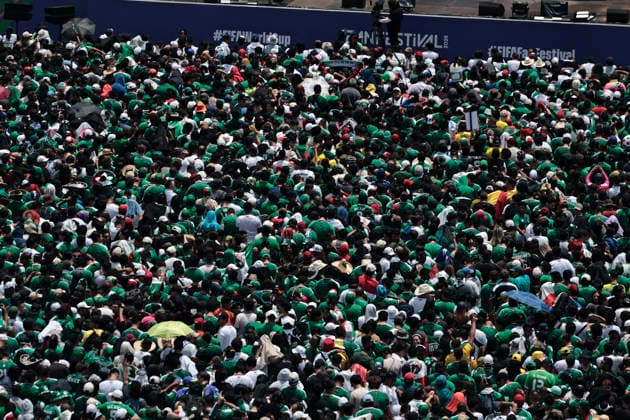 June 11, 2026, Mexico City, Cdmx, Mexico: The opening ceremony of the third FIFA World Cup 2026 in Mexico City has begun, broadcast live from Plaza de la ConstitucioÂ³n as part of the FIFA Fan Festival. Soccer fans are lining up in the streets to gather in the ZoÂ³calo for the opening match between the Mexican National Team and South Africa, which kicks off at 1:00 PM. Wearing jerseys, wigs, and carrying World Cup trophies, thousands of Mexicans and foreigners are coming together to enjoy the world s biggest sporting event. Mexico City Mexico - ZUMAp204 20260611_zip_p204_039 Copyright: xJosuexPerezx