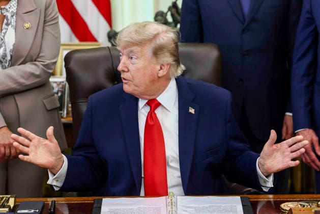 President Donald Trump speaks to reporters about restoring commercial fishing access to areas of the Pacific during a signing ceremony in the Oval Office of the White House in Washington DC on Thursday, June 11, 2026.  WAX20260611806 JIMxLOxSCALZO