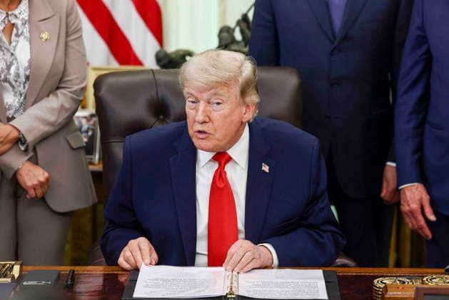 President Donald Trump speaks to reporters about restoring commercial fishing access to areas of the Pacific during a signing ceremony in the Oval Office of the White House in Washington DC on Thursday, June 11, 2026.  WAX20260611811 JIMxLOxSCALZO