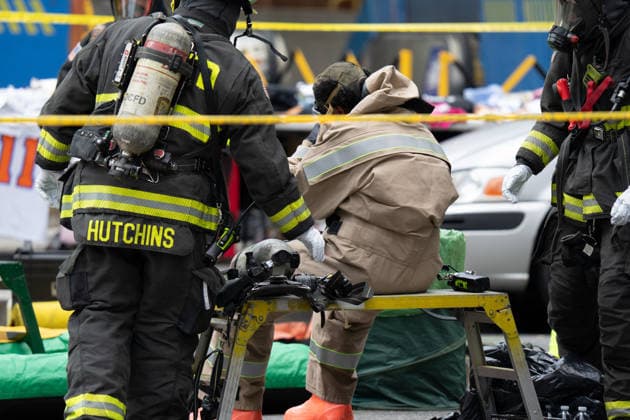 June 11, 2026, Washington, Dc, United States: Washington, D.C. fire fighters are decontaminated following a suspcious package incident near the Foggy Bottom Metro station in Washington, D.C. on June 11, 2026. Washington United States  - ZUMAl312 20260611_znp_l312_044 Copyright: xAndrewxLeydenx