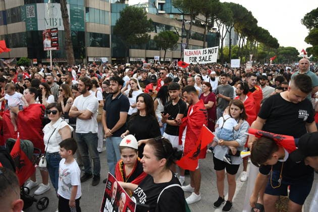 Protests against the Vlora tourism project continue in Albania TIRANA, ALBANIA - JUNE 11: People stage a protest against a planned tourism project in the Zvernec area of Avlonya (Vlora) as they gather at Skanderbeg Square in Tirana, Albania on June 11, 2026. Olsi Shehu Anadolu Tirana Albania. Editorial use only. Please get in touch for any other usage.  Copyright: x2026xAnadoluxOlsixShehux