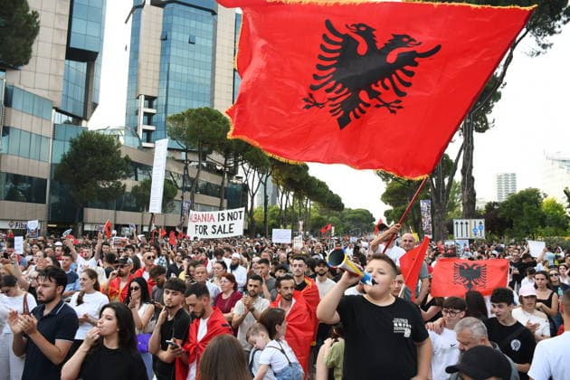 Protests against the Vlora tourism project continue in Albania TIRANA, ALBANIA - JUNE 11: People stage a protest against a planned tourism project in the Zvernec area of Avlonya (Vlora) as they gather at Skanderbeg Square in Tirana, Albania on June 11, 2026. Olsi Shehu Anadolu Tirana Albania. Editorial use only. Please get in touch for any other usage.  Copyright: x2026xAnadoluxOlsixShehux