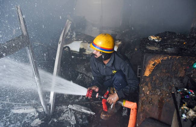 GHAZIABAD, INDIA - JUNE 11: Firefighters battle toxic, suffocating plumes of dense black smoke after massive blaze that erupted at a chemical factory in Hindon Vihar near Nandgram on June 11, 2026 in Ghaziabad, India. (Photo by Sakib Ali Hindustan Times) Massive Fire Broke Out At A Chemical Factory In Ghaziabad
