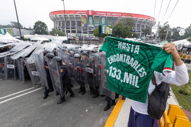 June 11, 2026, Mexico City, Mexico: Demonstrators took part in protests outside Mexico City Stadium in Mexico City on the opening day of the 2026 FIFA World Cup. The demonstration led to clashes with security personnel near the venue as part of a series of actions organized to highlight social demands, including concerns related to Mexico s disappearance crisis. Mexico City Mexico - ZUMAl178 20260611_znp_l178_008 Copyright: xCristianxLeyvax