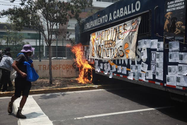 Demonstrators clash with police during the World Cup opener in Mexico City MEXICO CITY, MEXICO - JUNE 11: Smoke and flames rise from the burning materials during a protest against the World Cup, in Mexico City, Mexico on June 11, 2026. Thousands of demonstrators marched toward Banorte Stadium to protest against the World Cup, while some clashed with riot police outside the stadium where the World Cup opener was taking place. Daniel Cardenas Anadolu Mexico City Mexico. Editorial use only. Please get in touch for any other usage.  Copyright: x2026xAnadoluxDanielxCardenasx