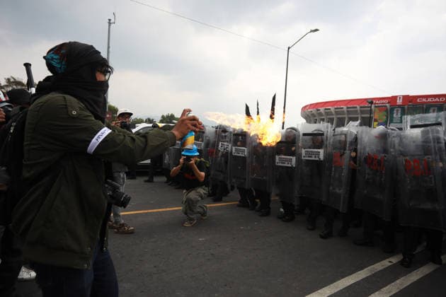 Demonstrators clash with police during the World Cup opener in Mexico City MEXICO CITY, MEXICO - JUNE 11: Demonstrators clash with riot police near Banorte Stadium during the World Cup opener, in Mexico City, Mexico on June 11, 2026. Thousands of demonstrators marched toward Banorte Stadium to protest against the World Cup, while some clashed with riot police outside the stadium where the World Cup opener was taking place. Daniel Cardenas Anadolu Mexico City Mexico. Editorial use only. Please get in touch for any other usage.  Copyright: x2026xAnadoluxDanielxCardenasx