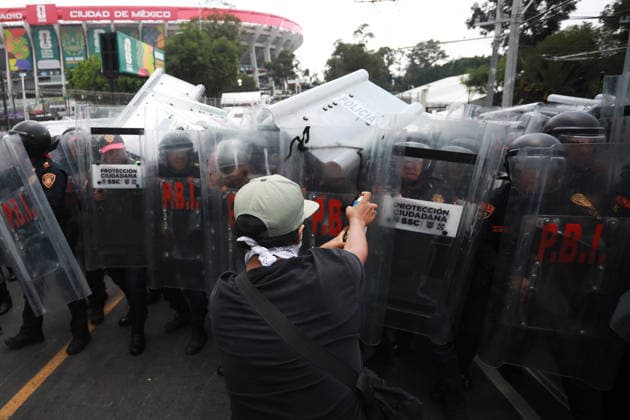 Demonstrators clash with police during the World Cup opener in Mexico City MEXICO CITY, MEXICO - JUNE 11: Demonstrators clash with riot police near Banorte Stadium during the World Cup opener, in Mexico City, Mexico on June 11, 2026. Thousands of demonstrators marched toward Banorte Stadium to protest against the World Cup, while some clashed with riot police outside the stadium where the World Cup opener was taking place. Daniel Cardenas Anadolu Mexico City Mexico. Editorial use only. Please get in touch for any other usage.  Copyright: x2026xAnadoluxDanielxCardenasx