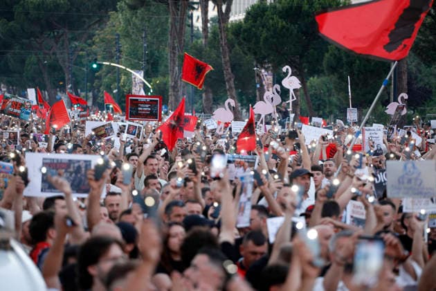 Protest against the construction of a luxury resort in Tirana, Albania. Protesters hold signs and Albanian national flags as they take part in a demonstration in front of the prime minister s office in Tirana on June 10, 2026, opposing the construction of a luxury resort in a protected natural area near the city of Vlore. Several thousand citizens demonstrated in Tirana for the ninth consecutive night to demand transparency on a luxury tourism complex project in the protected area of Narta Lagoon in the city of Vlore linked to US President Donald Trump s son-in-law Jared Kushner and his wife, Ivanka Trump. The project was planned for two areas along the Adriatic coast, the protected delta area of Vjosa-Narta and the nearby uninhabited islan Copyright: xLightxStudioxAgencyx xMaltonxDibrax