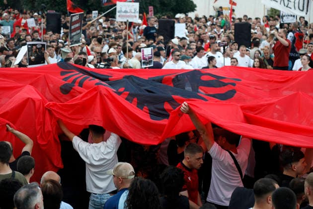 Protest against the construction of a luxury resort in Tirana, Albania. Protesters hold signs and Albanian national flags as they take part in a demonstration in front of the prime minister s office in Tirana on June 10, 2026, opposing the construction of a luxury resort in a protected natural area near the city of Vlore. Several thousand citizens demonstrated in Tirana for the ninth consecutive night to demand transparency on a luxury tourism complex project in the protected area of Narta Lagoon in the city of Vlore linked to US President Donald Trump s son-in-law Jared Kushner and his wife, Ivanka Trump. The project was planned for two areas along the Adriatic coast, the protected delta area of Vjosa-Narta and the nearby uninhabited islan Copyright: xLightxStudioxAgencyx xMaltonxDibrax