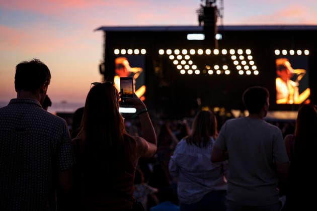 June 11, 2026, Porto, Portugal: Festival goer takes photos during the concert as the sun sets on the first day of the Primavera Sound festival. Porto Portugal - ZUMAs197 20260611_aaa_s197_126 Copyright: xRitaxFrancax