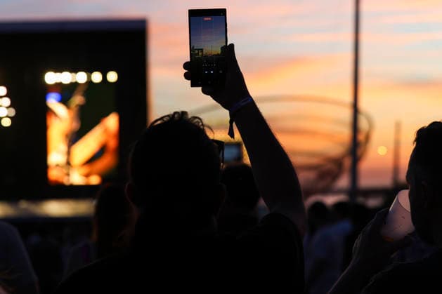 June 11, 2026, Porto, Portugal: Festival goer takes photos during the concert as the sun sets on the first day of the Primavera Sound festival. Porto Portugal - ZUMAs197 20260611_aaa_s197_148 Copyright: xRitaxFrancax