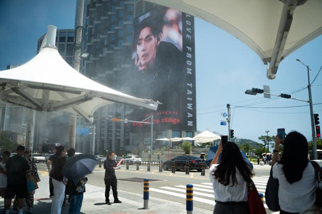 Fans gather at Haeundae Beach ahead of BTS World Tour Arirang in South Korea s Busan BUSAN, SOUTH KOREA - JUNE 12: Fans take photos and enjoy near Haeundae Beach ahead of the BTS World Tour Arirang concert at the Paradise Hotel Busan, in Busan, South Korea, on June 12, 2026. Various installations and promotional structures have been set up in the area as excitement builds for the event. Hwawon Ceci Lee Anadolu Busan South Korea. Editorial use only. Please get in touch for any other usage.  Copyright: x2026xAnadoluxHwawonxCecixLeex