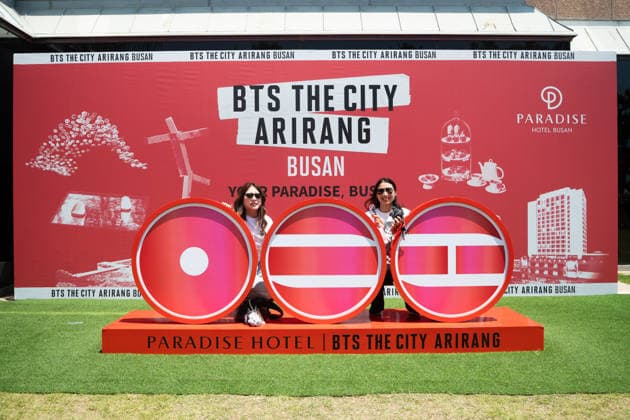 Fans gather at Haeundae Beach ahead of BTS World Tour Arirang in South Korea s Busan BUSAN, SOUTH KOREA - JUNE 12: Fans take photos and enjoy near Haeundae Beach ahead of the BTS World Tour Arirang concert at the Paradise Hotel Busan, in Busan, South Korea, on June 12, 2026. Various installations and promotional structures have been set up in the area as excitement builds for the event. Hwawon Ceci Lee Anadolu Busan South Korea. Editorial use only. Please get in touch for any other usage.  Copyright: x2026xAnadoluxHwawonxCecixLeex