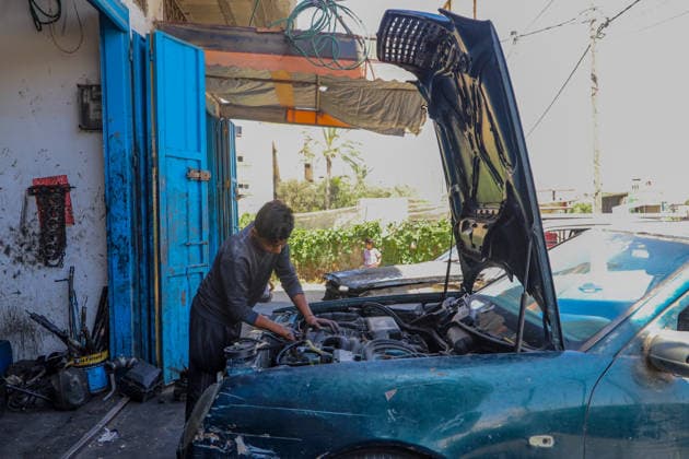 World Day Against Child Labour in Gaza GAZA CITY, GAZA, PALESTINE - JUNE 11: 12-year-old Palestinian Sami Ibrahim Hammad, who lost his father in Israeli attacks on Gaza, works long hours at an auto repair shop to support himself and his family instead of continuing his education during the World Day Against Child Labour on June 12, 2026 in Gaza City, Gaza, Palestine. Khalil Ramzi Alkahlut Anadolu Gaza City Gaza. Editorial use only. Please get in touch for any other usage.  Copyright: x2026xAnadoluxKhalilxRamzixAlkahlutx