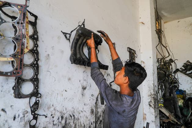 World Day Against Child Labour in Gaza GAZA CITY, GAZA, PALESTINE - JUNE 11: 12-year-old Palestinian Sami Ibrahim Hammad, who lost his father in Israeli attacks on Gaza, works long hours at an auto repair shop to support himself and his family instead of continuing his education during the World Day Against Child Labour on June 12, 2026 in Gaza City, Gaza, Palestine. Khalil Ramzi Alkahlut Anadolu Gaza City Gaza. Editorial use only. Please get in touch for any other usage.  Copyright: x2026xAnadoluxKhalilxRamzixAlkahlutx
