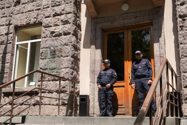 ARMENIA, YEREVAN - JUNE 12, 2026: Police officers stand guard outside as the Strong Armenia opposition party files a request to the Central Election Commission to annul the results of the June 7 election to the National Assembly. Alexander Patrin TASS  93695787