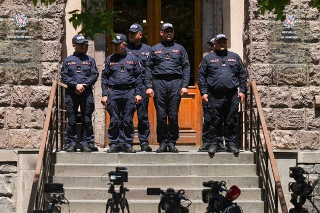 ARMENIA, YEREVAN - JUNE 12, 2026: Police officers stand guard outside as the Strong Armenia opposition party files a request to the Central Election Commission to annul the results of the June 7 election to the National Assembly. Alexander Patrin TASS  93695789