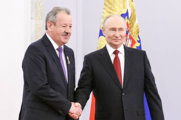 RUSSIA, MOSCOW - JUNE 12, 2026: Nikolai Russu, Motostroy-11 General Director, accepts the Gold Star of the Hero of Labour from Vladimir Putin, President of Russia, during a ceremony to award state decorations at the Grand Kremlin Palace on Russia Day celebrated annually on June 12. Sergei Karpukhin TASS  93698168