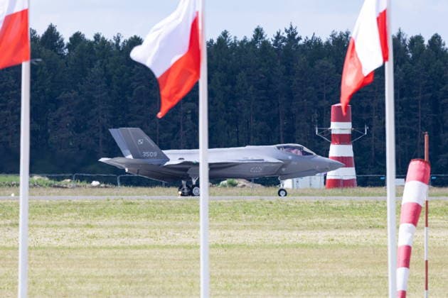 Lask 11.06.2026. The ceremony of official acceptance of F-35 aircraft into the Polish Armed Forces in 32nd Tactical Air Base Ceremonia oficjalnego przyjecia samolotow F-35 do Sil Zbrojnych w 32 Bazie Lotnictwa Taktycznego w Lasku. Persons Shown: Mysliwiec F-35 Husarz Flagi Polski Fot. Antoni Byszewski Arena Akcji NEWSPIX.PL --- newspix.pl POLAND OUT! 