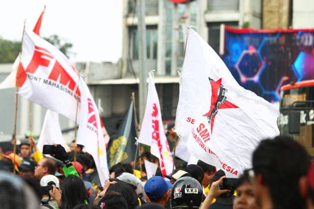 June 12, 2026, Jakarta, Central Jakarta, Indonesia: Thousands of university students took to the streets of IndonesiaÃ¢â‚¬â ¢s capital on Friday, as the Student Executive Board of the University of Indonesia (BEM UI) and the Greater Jakarta Student Alliance staged a large-scale demonstration at the iconic Bundaran HI in Central Jakarta.....The protest, which drew an estimated 1,500 participants from various universities across the Greater Jakarta region, highlighted growing concerns over economic hardship, government spending, and public policy. Demonstrators gathered from the morning hours carrying banners, posters, and placards expressing criticism of several key government programs and decisions.....At the center of the protest was a cal  - ZUMAp146 20260612_zap_p146_039 Copyright: xDennyxPohanx