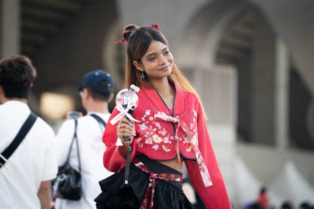 Fans gather ahead of BTS World Tour Arirang in South Korea s Busan BUSAN, SOUTH KOREA - JUNE 12: A fan holds a BTS lightstick as fans gather at the Busan Asiad Main Stadium, the venue for BTS World Tour Arirang in Busan, South Korea on June 12, 2026. Hwawon Ceci Lee Anadolu Busan South Korea. Editorial use only. Please get in touch for any other usage.  Copyright: x2026xAnadoluxHwawonxCecixLeex