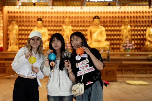 Fans gather ahead of BTS World Tour Arirang in South Korea s Busan BUSAN, SOUTH KOREA - JUNE 12: Fans pose for photos as Naewonjeongsa Temple in Busan is hosting a temple stay program for fans attending BTS World Tour Arirang who do not have accommodation, in Busan, South Korea on June 12, 2026. Hwawon Ceci Lee Anadolu Busan South Korea. Editorial use only. Please get in touch for any other usage.  Copyright: x2026xAnadoluxHwawonxCecixLeex