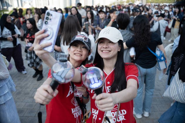 Fans gather ahead of BTS World Tour Arirang in South Korea s Busan BUSAN, SOUTH KOREA - JUNE 12: Fans pose for photos as BTS photos and characters are displayed at Jonghap Undongjang Station near Busan Asiad Main Stadium, the venue for BTS World Tour Arirang , in Busan, South Korea on June 12, 2026. Hwawon Ceci Lee Anadolu Busan South Korea. Editorial use only. Please get in touch for any other usage.  Copyright: x2026xAnadoluxHwawonxCecixLeex