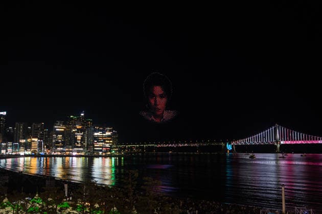 Fans gather ahead of BTS World Tour Arirang in South Korea s Busan BUSAN, SOUTH KOREA - JUNE 12: A BTS drone show is taking place at Gwangalli Beach in Busan, South Korea on June 12, 2026. Hwawon Ceci Lee Anadolu Busan South Korea. Editorial use only. Please get in touch for any other usage.  Copyright: x2026xAnadoluxHwawonxCecixLeex