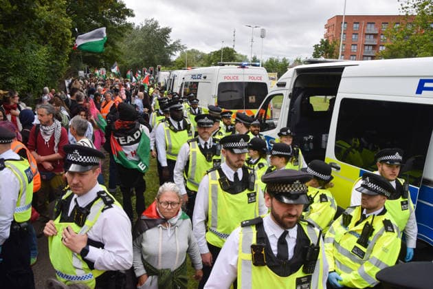 June 12, 2026, London, England, United Kingdom: Police officers arrest protesters sitting outside Woolwich Crown Court with signs stating Ã¢â‚¬ËœSaving lives is not terrorism, I support Palestine ActionÃ¢â‚¬â ¢. Protesters gathered during the sentencing of the activists known as the Filton 4, associated with Palestine Action. The judge will rule whether the activists will be sentenced as terrorists , following their convictions for criminal damage after a direct action at the factory of arms company Elbit Systems in Filton, close to Bristol. London United Kingdom  - ZUMAv130 20260612_zip_v130_010 Copyright: xVukxValcicx