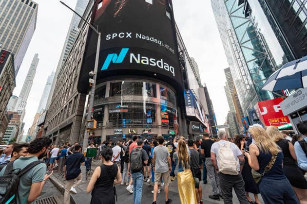 SpaceX largest IPO in history The media and the curious congregate outside of NASDAQ headquarters in Times Square in New York on Friday, June 12, 2026 for the debut of the SpaceX IPO. The IPO price was set at $135 a share making it the largest IPO in history and making Elon Musk the world™s first trillionaire. (  RichardxB.xLevine