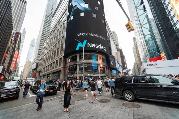 SpaceX largest IPO in history The media and the curious congregate outside of NASDAQ headquarters in Times Square in New York on Friday, June 12, 2026 for the debut of the SpaceX IPO. The IPO price was set at $135 a share making it the largest IPO in history and making Elon Musk the world™s first trillionaire. (  RichardxB.xLevine