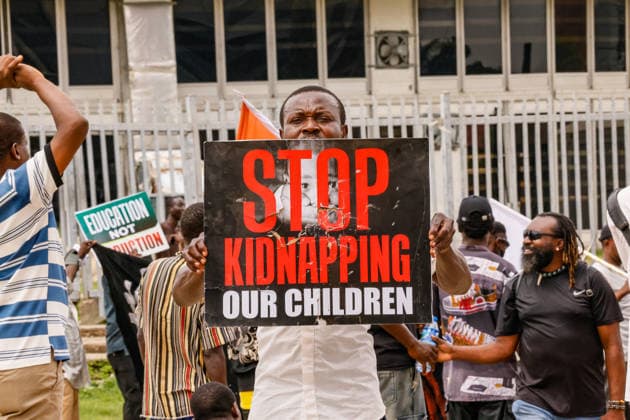 Protest held on Democracy Day over security and economic crisis in Nigeria ABUJA, NIGERIA - JUNE 12: People chanting slogans against the government and carrying banners attend a protest held on June 12 Democracy Day against rising security and economic problems in Abuja, Nigeria, on June 12, 2026. In the demonstration, which saw high participation, protesters expressed their reaction to increasing security issues in the country, mass kidnappings of students from schools, and economic hardship. Emmanuel Osodi Anadolu Abuja Nigeria. Editorial use only. Please get in touch for any other usage.  Copyright: x2026xAnadoluxEmmanuelxOsodix