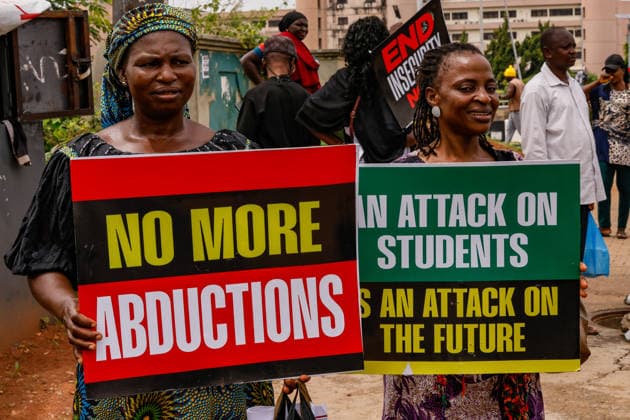 Protest held on Democracy Day over security and economic crisis in Nigeria ABUJA, NIGERIA - JUNE 12: People chanting slogans against the government and carrying banners attend a protest held on June 12 Democracy Day against rising security and economic problems in Abuja, Nigeria, on June 12, 2026. In the demonstration, which saw high participation, protesters expressed their reaction to increasing security issues in the country, mass kidnappings of students from schools, and economic hardship. Emmanuel Osodi Anadolu Abuja Nigeria. Editorial use only. Please get in touch for any other usage.  Copyright: x2026xAnadoluxEmmanuelxOsodix