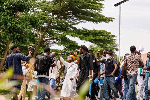 Protest held on Democracy Day over security and economic crisis in Nigeria ABUJA, NIGERIA - JUNE 12: People chanting slogans against the government and carrying banners attend a protest held on June 12 Democracy Day against rising security and economic problems in Abuja, Nigeria, on June 12, 2026. In the demonstration, which saw high participation, protesters expressed their reaction to increasing security issues in the country, mass kidnappings of students from schools, and economic hardship. Emmanuel Osodi Anadolu Abuja Nigeria. Editorial use only. Please get in touch for any other usage.  Copyright: x2026xAnadoluxEmmanuelxOsodix