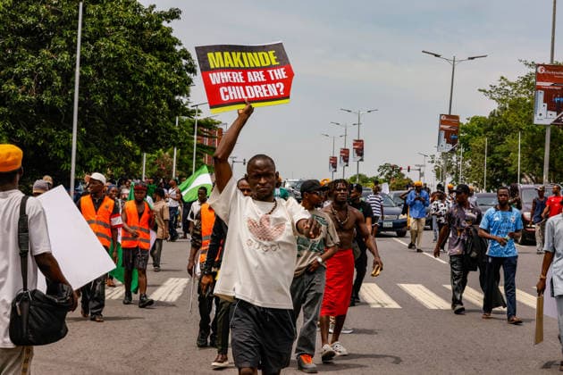 Protest held on Democracy Day over security and economic crisis in Nigeria ABUJA, NIGERIA - JUNE 12: People chanting slogans against the government and carrying banners attend a protest held on June 12 Democracy Day against rising security and economic problems in Abuja, Nigeria, on June 12, 2026. In the demonstration, which saw high participation, protesters expressed their reaction to increasing security issues in the country, mass kidnappings of students from schools, and economic hardship. Emmanuel Osodi Anadolu Abuja Nigeria. Editorial use only. Please get in touch for any other usage.  Copyright: x2026xAnadoluxEmmanuelxOsodix
