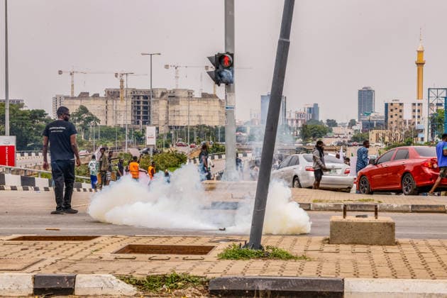 Protest held on Democracy Day over security and economic crisis in Nigeria ABUJA, NIGERIA - JUNE 12: Security forces use tear gas to disperse the protesters as people chanting slogans against the government and carrying banners attend a protest held on June 12 Democracy Day against rising security and economic problems in Abuja, Nigeria, on June 12, 2026. Emmanuel Osodi Anadolu Abuja Nigeria. Editorial use only. Please get in touch for any other usage.  Copyright: x2026xAnadoluxEmmanuelxOsodix