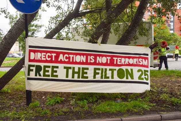 June 12, 2026, London, England, United Kingdom: A Free the Filton 25 banner hangs outside Woolwich Crown Court during the sentencing of the activists known as the Filton 4, associated with Palestine Action. The judge will rule whether the activists will be sentenced as terrorists , following their convictions for criminal damage after a direct action at the factory of arms company Elbit Systems in Filton, close to Bristol. London United Kingdom - ZUMAv130 20260612_zip_v130_042 Copyright: xVukxValcicx