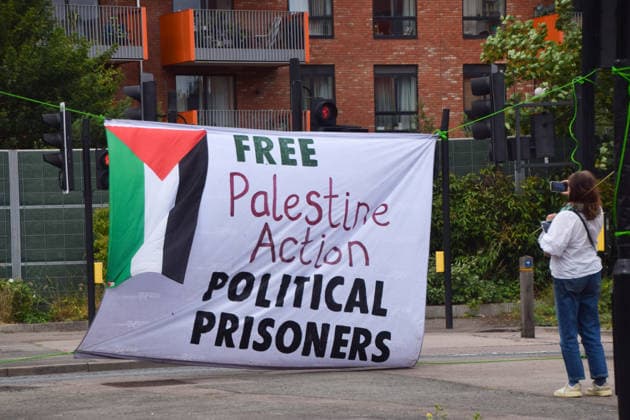 June 12, 2026, London, England, United Kingdom: A banner hangs outside Woolwich Crown Court during the sentencing of the activists known as the Filton 4, associated with Palestine Action. The judge will rule whether the activists will be sentenced as terrorists , following their convictions for criminal damage after a direct action at the factory of arms company Elbit Systems in Filton, close to Bristol. London United Kingdom - ZUMAv130 20260612_zip_v130_043 Copyright: xVukxValcicx