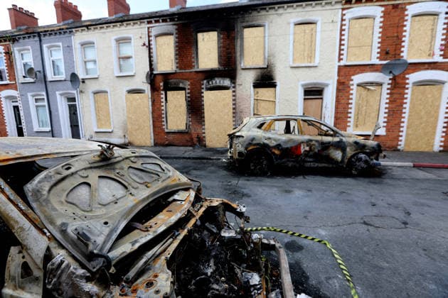 Aftermath of the race riots in Belfast BELFAST, NORTHERN IRELAND - JUNE 12: A view of burned cars on the street as a clean-up operation is under way after a race riots erupted in Belfast, Northern Ireland, on June 12, 2026. Twelve police officers were injured and 27 people made homeless during two nights of unrest. Conor McCaughley Anadolu Belfast Northern Ireland. Editorial use only. Please get in touch for any other usage.  Copyright: x2026xAnadoluxConorxMcCaughleyx