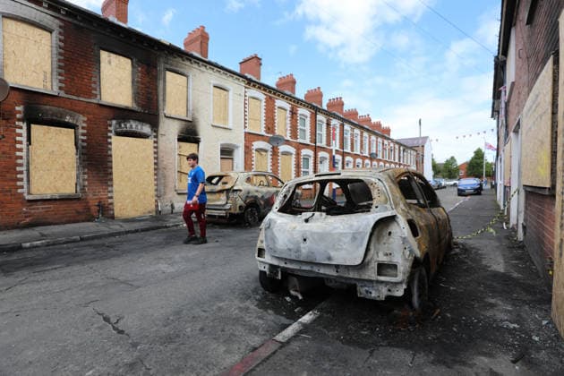 Aftermath of the race riots in Belfast BELFAST, NORTHERN IRELAND - JUNE 12: A view of burned cars on the street as a clean-up operation is under way after a race riots erupted in Belfast, Northern Ireland, on June 12, 2026. Twelve police officers were injured and 27 people made homeless during two nights of unrest. Conor McCaughley Anadolu Belfast Northern Ireland. Editorial use only. Please get in touch for any other usage.  Copyright: x2026xAnadoluxConorxMcCaughleyx