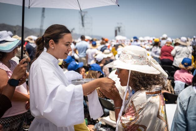 Pope Leo XIV visits Tenerife in Spain TENERIFE, CANARY ISLANDS, SPAIN - JUNE 12: People attend Mass as Pope Leo XIV celebrates a service before tens of thousands of worshippers at the Port of Santa Cruz de Tenerife in the Canary Islands, Spain on June 12, 2026. The open-air liturgy marked the culmination of his seven-day apostolic visit to Spain and followed a day focused on migration and human dignity in the Canary Islands, a key gateway on the Atlantic migration route. In his homily, the pontiff urged solidarity, reconciliation, and a renewed commitment to placing people before economic interests. Andres Gutierrez Anadolu Canary Islands Spain. Editorial use only. Please get in touch for any other usage.  Copyright: x2026xAnadoluxAndresxGutierrezx