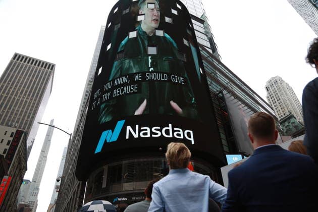 (260612) -- NEW YORK, June 12, 2026 -- People watch the IPO ceremony of SpaceX outside the Nasdaq building in Times Square in New York City, the United States, June 12, 2026. Space Exploration Technologies Corp., known as SpaceX, has priced its initial public offering (IPO) at 135 U.S. dollars per share and raised 75 billion dollars through the sale of about 555.56 million shares, U.S. media reported Thursday. The IPO values the company at about 1.77 trillion dollars, according to reports. In terms of fundraising size, the IPO would set a record for an initial public offering. Based on the valuation, SpaceX would rank among the top 10 most valuable U.S.-listed companies. ) U.S.-NEW YORK-SPACEX-IPO LiuxYanan 