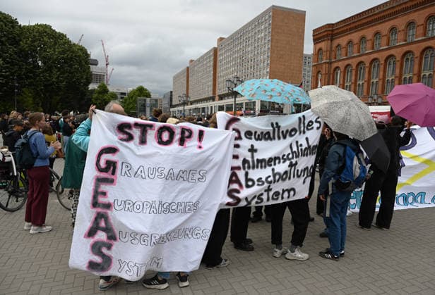A protest against the EU’s Common European Asylum System (CEAS) in Berlin BERLIN, GERMANY - JUNE 12: People take part in a protest Stop the implementation of CEAS! Right to stay for all! against the implementation of the European Union s Common European Asylum System (CEAS) outside the Rotes Rathaus in Berlin, Germany, June 12, 2026. Protesters say the implementation of CEAS will lead to restrictions on the rights of asylum seekers. The protest coincides with the date the European Union’s Common European Asylum System (CEAS) starts applying across the block. Volodymyr Sindieiev Anadolu Berlin Germany. Editorial use only. Please get in touch for any other usage.  Copyright: x2026xAnadoluxVolodymyrxSindieievx