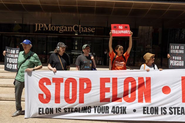 June 12, 2026, New York, New York, USA: A coalition of organizations rally outside JP Morgan Chase headquarters in Midtown Manhattan to disrupt Chase CEO J. Dimon s party celebrating E. Musk s launch of SpaceX s IPO on the Nasdaq Stock Exchange and Musk s net worth as a trillionaire. People hold a banner and signs that read STOP ELON ELON IS STEALING YOUR 401K ELON IS STEALING YOUR PENSION NO TRILLIONAIRES. Organizers denounce working people having SpaceX forced into their 401ks and pensions and the emergence of trillionaire-level wealth in the United States while millions of people face housing insecurity, medical debt, and low wages. New York USA  - ZUMAr174 20260612_znp_r174_006 Copyright: xGinaxMxRandazzox