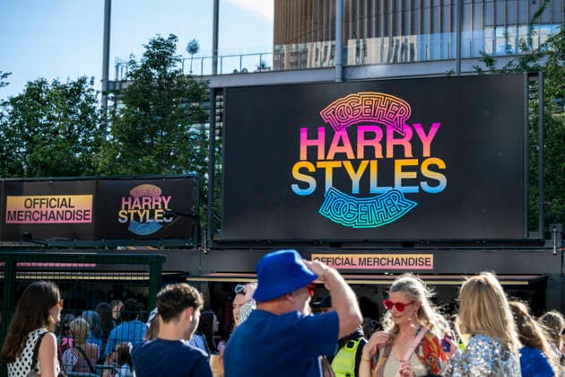June 12, 2026, London, London, UK: LONDON, UK. Officiall merchandise as tans arrive on Olympic way to attend Harry StylesÃ¢â‚¬â ¢ concert, part of the Together Together tour as he begins a 12-night residency at Wembley Stadium. London UK  - ZUMAl94_ 20260612_zaf_l94_033 Copyright: xStephenxChungx