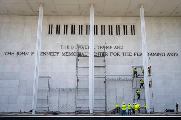 Construction workers build a scaffolding near the sign for the Donald J. Trump and The John F. Kennedy Memorial Center for the Performing Arts in Washington, DC on Friday, June 12, 2026. The Kennedy Center board voted to seek an emergency appeal to block a court order requiring the removal of President Trump s name from the Kennedy Center, but a judge denied their request.  WAP20260612408 BONNIExCASH