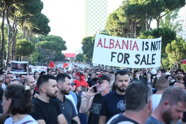Protests against Zvernec tourism project continue for a 13th Day in Albania TIRANA, ALBANIA - JUNE 12: Demonstrators gather carrying various banners and placards, waving Albanian flags marched to the Prime Minister’s Office on the Boulevard of the Martyrs of the Nation to protest against a planned tourism project in the Zvernec area of the city of Vlora continued for a 13th day at Skanderbeg Square, in Tirana, Albania, on June 12, 2026. Olsi Shehu Anadolu Tirana Albania. Editorial use only. Please get in touch for any other usage.  Copyright: x2026xAnadoluxOlsixShehux